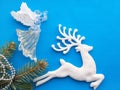 ÃÂ¡hristmas background with decorations deer, angel, branch